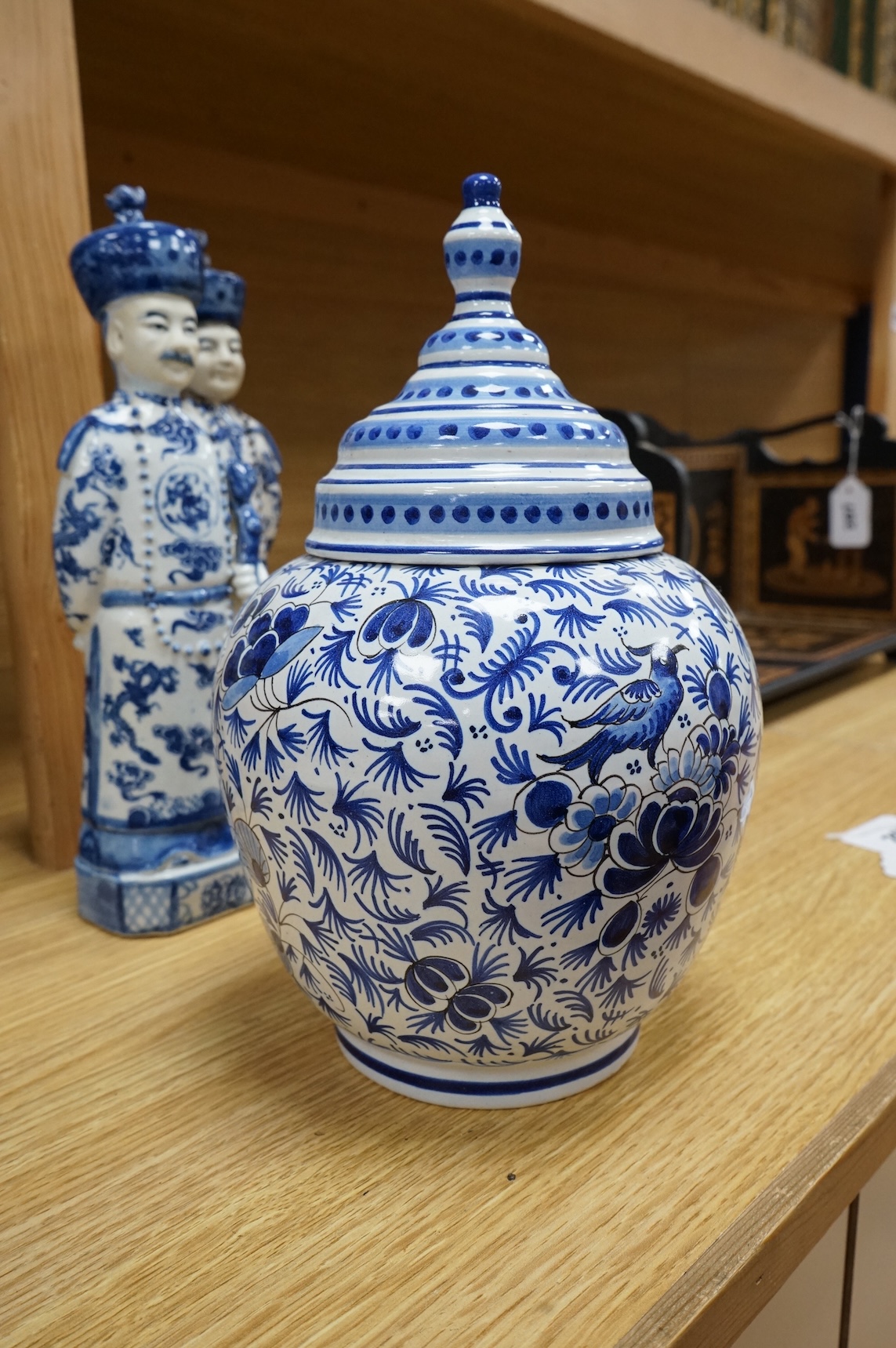 Three Chinese blue and white porcelain figures H 29cm x 9cm., and a Delft tobacco jar H 26cm W 18cm